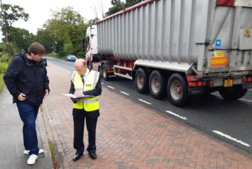 Philip Allott and Luke Vardy by the busy road in Hemingbrough.