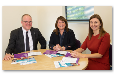 Sat around a table - Simon Dennis, Zoe Metcalfe and Jenni Newberry review the VAWG Strategy