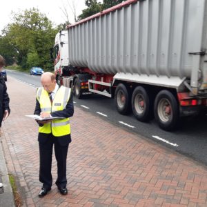 Philip Allott and Luke Vardy by the busy road in Hemingbrough.