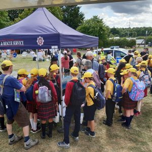 School children watching the water safety demonstration
