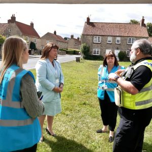 Zoë talking with NYP and Community Safety Hub Team