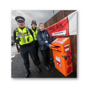 North Yorkshire Council’s community safety officer, Evie Griffiths, with North Yorkshire Police officers, PCs Brendon Frith and Kelvin Troughton, at the knife drop bin in Harrogate
