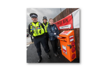 North Yorkshire Council’s community safety officer, Evie Griffiths, with North Yorkshire Police officers, PCs Brendon Frith and Kelvin Troughton, at the knife drop bin in Harrogate