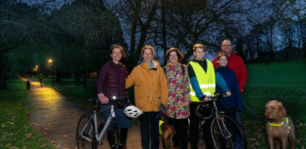 (From left to right) Katie Birks, Elaine Hiser, Fiona Protheroe, Will Hiser-Dobson, Isla Hiser Dobson and Richard Dobson in Skipton’s Aireville Park, where new lighting has been introduced. Also pictured are their four-legged friends Tiree and Coll (far right).