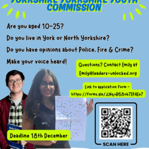 Youth Commission advert - Join the youth commission two young people holding up a piece of paper